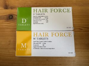 筆者が服用しているデュタステリドとミノキシジルタブレットのパッケージ写真(DMMオンラインクリニックより処方)